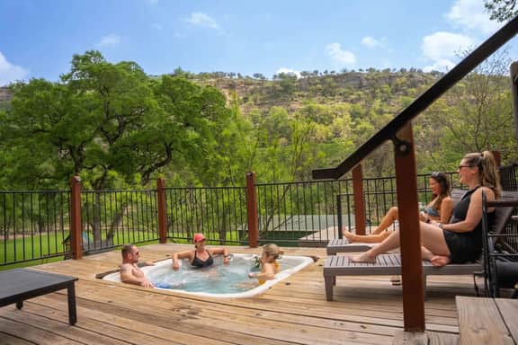 Riverfront Group Retreat | Hot Tub + Billiards | Sleeps 14 | Guadalupe River - Image 2